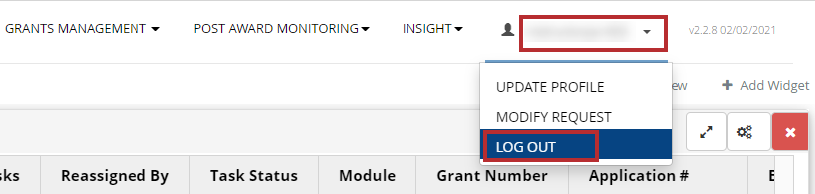 The GrantSolutions Portal screen with the username drop and the Log Out drop-down option highlighted.